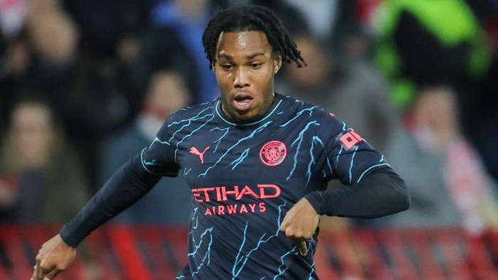Manchester Citys English midfielder #92 Micah Hamilton runs with the ball during the UEFA Champions League Group G day 6 group stage football match between Crvena Zvezda (Red Star Belgrade) and Manchester City at the Red Star stadium in Belgrade, on December 13, 2023. (Photo by PEDJA MILOSAVLJEVIC / AFP)