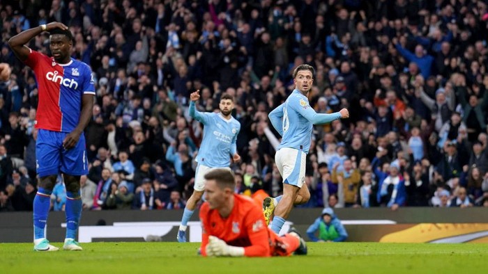 Manchester Citys Jack Grealish celebrates scoring the opening goal during the Premier League match at the Etihad Stadium, Manchester. Picture date: Saturday December 16, 2023. (Photo by Martin Rickett/PA Images via Getty Images)