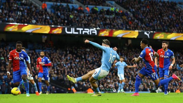 Soccer Football - Premier League - Manchester City v Crystal Palace - Etihad Stadium, Manchester, Britain - December 16, 2023 Manchester City's Jack Grealish scores their first goal REUTERS/Carl Recine NO USE WITH UNAUTHORIZED AUDIO, VIDEO, DATA, FIXTURE LISTS, CLUB/LEAGUE LOGOS OR 'LIVE' SERVICES. ONLINE IN-MATCH USE LIMITED TO 45 IMAGES, NO VIDEO EMULATION. NO USE IN BETTING, GAMES OR SINGLE CLUB/LEAGUE/PLAYER PUBLICATIONS.