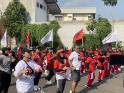 Hasto Lari Marathon Bareng Siti Atikoh: Bentuk Komitmen Gerak Cepat Ganjar