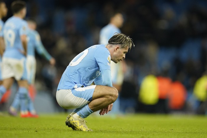 Manchester Citys Jack Grealish reacts disappointed after the English Premier League soccer match between Manchester City and Crystal Palace at the Etihad Stadium in Manchester, England, Saturday, Dec.16, 2023. (AP Photo/Dave Thompson)