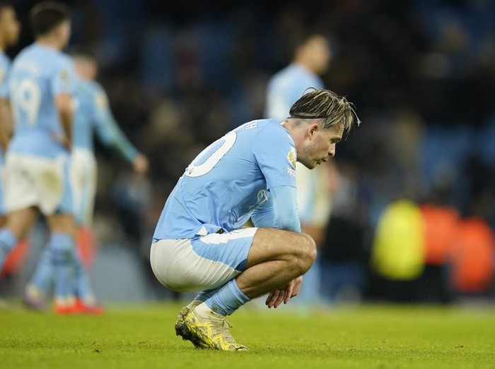 Manchester City's Jack Grealish reacts disappointed after the English Premier League soccer match between Manchester City and Crystal Palace at the Etihad Stadium in Manchester, England, Saturday, Dec.16, 2023. (AP Photo/Dave Thompson)
