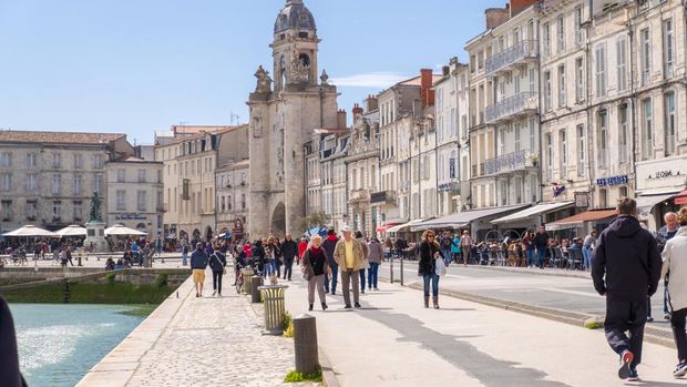 La Rochelle, France - May 08, 2019: A view of the harbour at Vieux port de La Rochelle and gateway of the Big Clock in La Rochelle, France