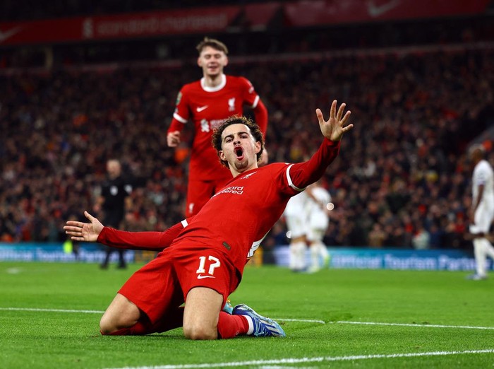 Soccer Football - Carabao Cup - Quarter Final - Liverpool v West Ham United - Anfield, Liverpool, Britain - December 20, 2023 Liverpool's Curtis Jones celebrates scoring their fifth goal REUTERS/Molly Darlington NO USE WITH UNAUTHORIZED AUDIO, VIDEO, DATA, FIXTURE LISTS, CLUB/LEAGUE LOGOS OR 'LIVE' SERVICES. ONLINE IN-MATCH USE LIMITED TO 45 IMAGES, NO VIDEO EMULATION. NO USE IN BETTING, GAMES OR SINGLE CLUB/LEAGUE/PLAYER PUBLICATIONS.