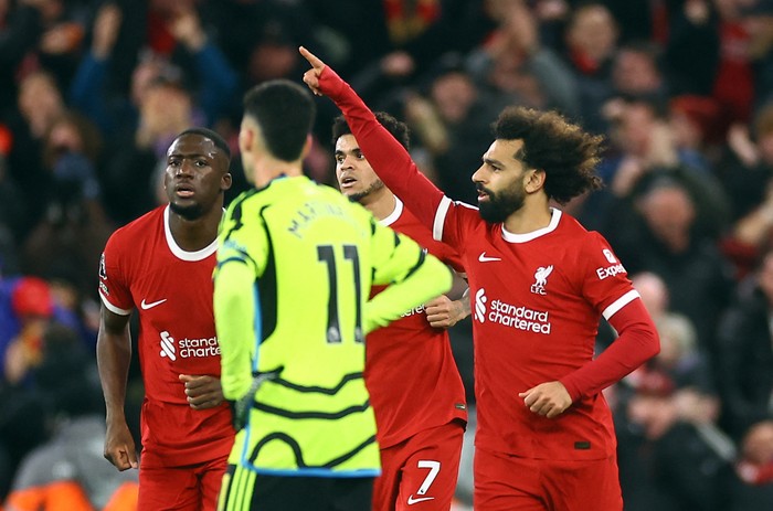 Soccer Football - Premier League - Liverpool v Arsenal - Anfield, Liverpool, Britain - December 23, 2023  Liverpool's Mohamed Salah celebrates scoring their first goal REUTERS/Carl Recine NO USE WITH UNAUTHORIZED AUDIO, VIDEO, DATA, FIXTURE LISTS, CLUB/LEAGUE LOGOS OR 'LIVE' SERVICES. ONLINE IN-MATCH USE LIMITED TO 45 IMAGES, NO VIDEO EMULATION. NO USE IN BETTING, GAMES OR SINGLE CLUB/LEAGUE/PLAYER PUBLICATIONS.