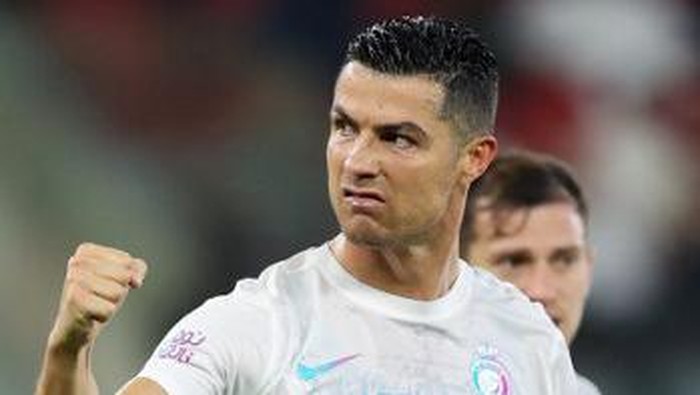 Nassr's Portuguese forward #07 Cristiano Ronaldo reacts during the Saudi Pro League football match between Al-Ittihad and Al-Nassr at King Abdullah Sports City Stadium in Jeddah on December 26, 2023. (Photo by AFP)