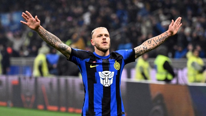 Soccer Football - Serie A - Inter Milan v Udinese - San Siro, Milan, Italy - December 9, 2023 Inter Milans Federico Dimarco celebrates scoring their second goal REUTERS/Alberto Lingria