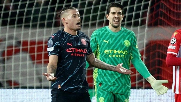 Soccer Football - Champions League - Group G - Crvena Zvezda v Manchester City - Rajko Mitic Stadium, Belgrade, Serbia - December 13, 2023 Manchester Citys Jack Grealish and Kalvin Phillips react REUTERS/Marko Djurica