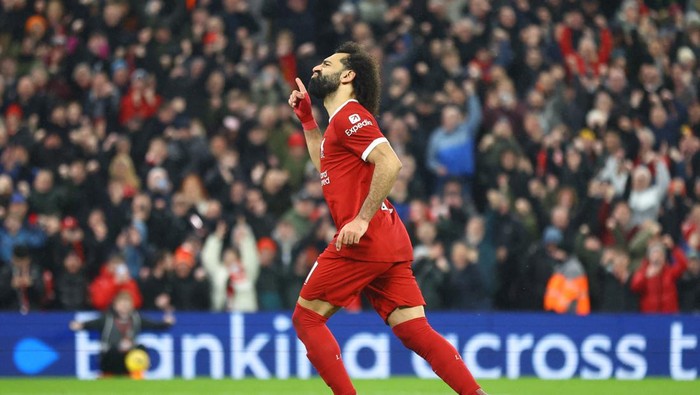 Soccer Football - Premier League - Liverpool v Newcastle United - Anfield, Liverpool, Britain - January 1, 2024 Liverpools Mohamed Salah celebrates scoring their fourth goal REUTERS/Carl Recine NO USE WITH UNAUTHORIZED AUDIO, VIDEO, DATA, FIXTURE LISTS, CLUB/LEAGUE LOGOS OR LIVE SERVICES. ONLINE IN-MATCH USE LIMITED TO 45 IMAGES, NO VIDEO EMULATION. NO USE IN BETTING, GAMES OR SINGLE CLUB/LEAGUE/PLAYER PUBLICATIONS.