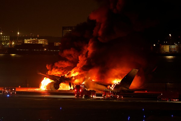 Japan Airlines A350 airplane is on fire at Haneda international airport in Tokyo, Japan January 2, 2024. REUTERS/Issei Kato