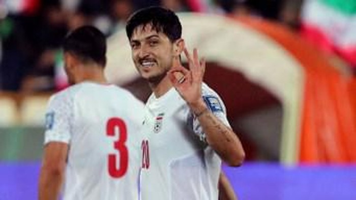 Irans forward #20 Sardar Azmoun celebrates scoring a goal during the 2026 FIFA World Cup AFC qualifiers football match between Iran and Hong Kong at the Azadi Stadium in Tehran on November 16, 2023. (Photo by AFP)