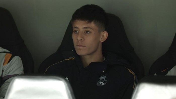 Real Madrids Turkish midfielder #24 Arda Guler watches from the bench the UEFA Champions League group C football match between Real Madrid CF and SC Braga at the Santiago Bernabeu stadium in Madrid on November 8, 2023. (Photo by Thomas COEX / AFP)