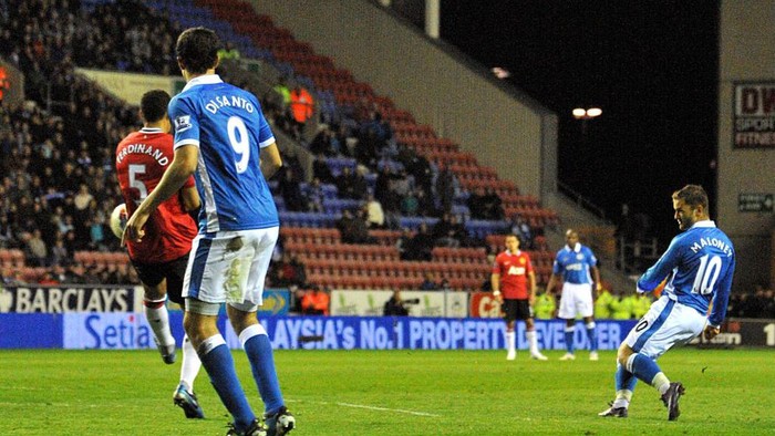 Wigan Athletics Shaun Maloney scores his sides first goal of the game   (Photo by Neal Simpson - PA Images via Getty Images)