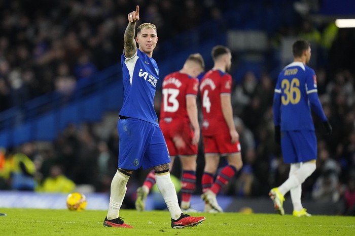 Chelsea's Enzo Fernandez celebrates after scoring his side's fourth goal during the English FA Cup soccer match between Chelsea and Preston North End at Stamford Bridge stadium in London, Saturday, Jan. 6, 2024. (AP Photo/Kirsty Wigglesworth)