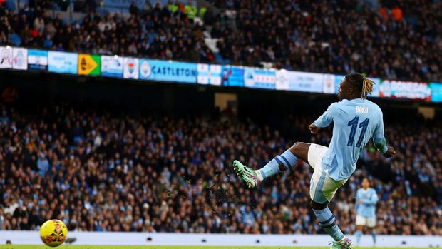 Soccer Football -  FA Cup - Third Round - Manchester City v Huddersfield Town - Etihad Stadium, Manchester, Britain - January 7, 2024 Manchester City's Jeremy Doku scores their fifth goal Action Images via Reuters/Lee Smith