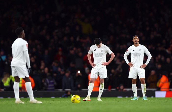 Soccer Football -  FA Cup - Third Round - Arsenal v Liverpool - Emirates Stadium, London, Britain - January 7, 2024 Arsenal's Declan Rice and Arsenal's William Saliba look dejected after Liverpool's Luis Diaz scored their second goal Action Images via Reuters/Matthew Childs