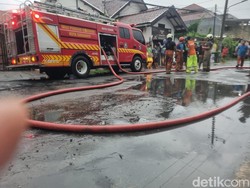 Cara Cepat PMK Surabaya Surutkan Genangan di Permukiman Warga