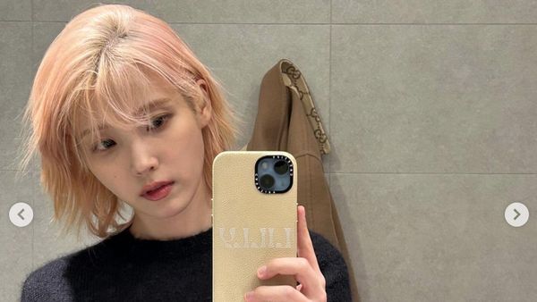 7 Foto IU Tampil dengan Rambut Pink Jelang Comeback, Bikin Fans Pangling