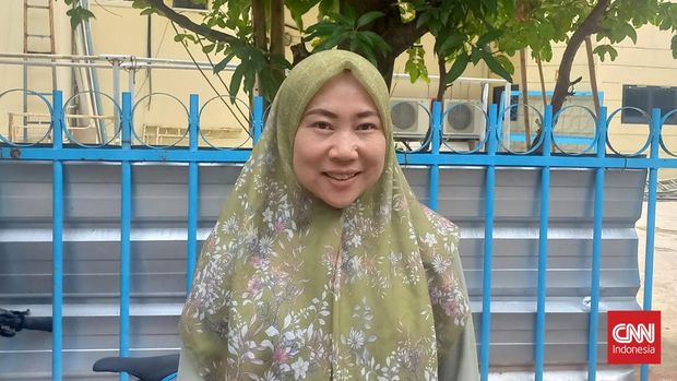 Lia (33), seorang warga yang mendukung paslon 02.