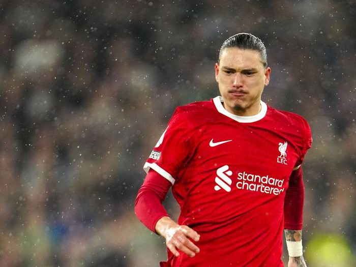 Liverpool's Darwin Nunez runs for the ball during the English Premier League soccer match between Liverpool and Newcastle, at Anfield stadium in Liverpool, England, Monday, Jan. 1, 2024. (AP Photo/Jon Super)