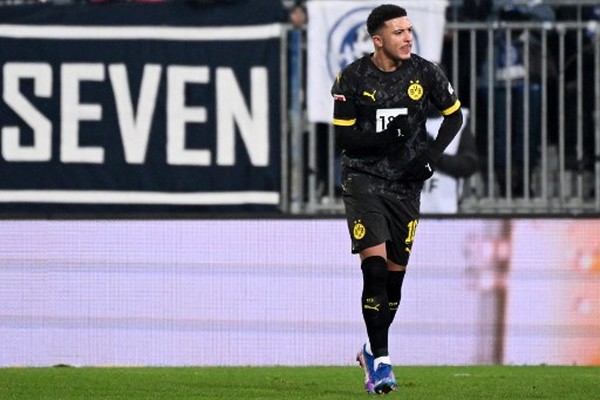 Dortmunds English forward #10 Jadon Sancho celebrates his teams second goal during the German first division Bundesliga football match between SV Darmstadt 98 v Borussia Dortmund in Darmstadt, western Germany on January 13, 2024. (Photo by Kirill KUDRYAVTSEV / AFP) / DFL REGULATIONS PROHIBIT ANY USE OF PHOTOGRAPHS AS IMAGE SEQUENCES AND/OR QUASI-VIDEO