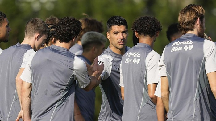 Luis Suarez Inter Miami forward Luis Suarez, center, greets his teammates at the start of a training session for the MLS soccer team, Saturday, Jan. 13, 2024, in Fort Lauderdale, Fla. (AP Photo/Rebecca Blackwell)