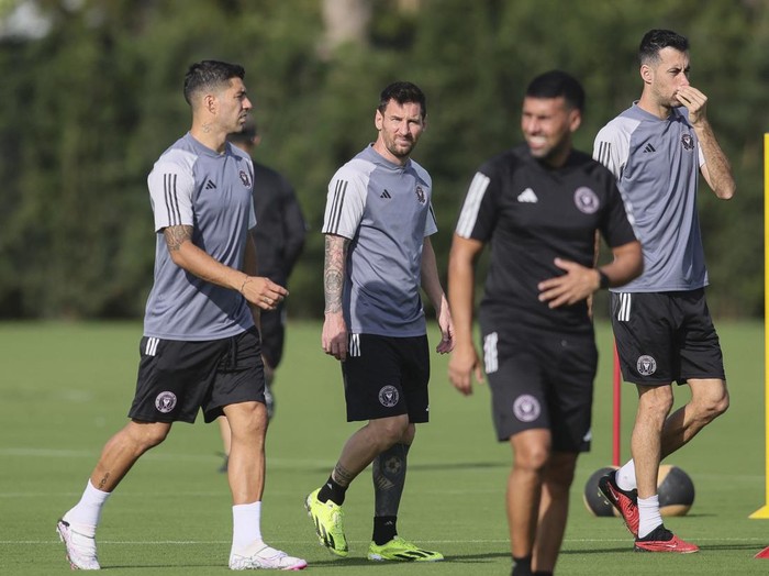 Jan 13, 2024; Fort Lauderdale, FL, USA; Inter Miami CF forward Luis Suarez (9), forward Lionel Messi (10) and midfielder Sergio Busquets (5) look on during practice at Florida Blue Training Center. Mandatory Credit: Sam Navarro-USA TODAY Sports