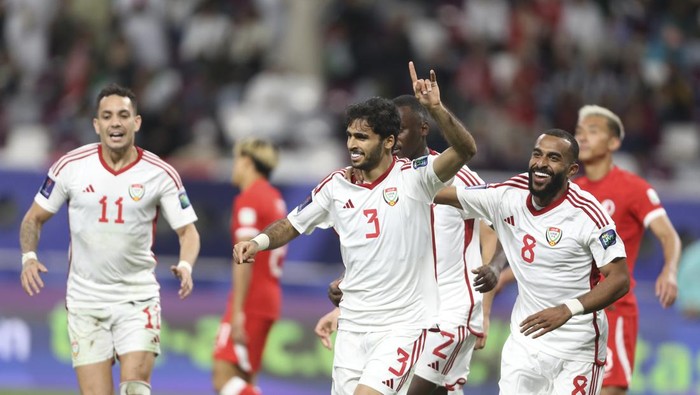 United Arab Emirates Zayed Sultan Alzaabi, centre, celebrates with teammates after scoring a goal during the Asian Cup Group C soccer match between Hong Kong and United Arab Emirates at Khalifa International Stadium in Doha, Qatar, Sunday, Jan. 14, 2024. (AP Photo/Hussein Sayed)