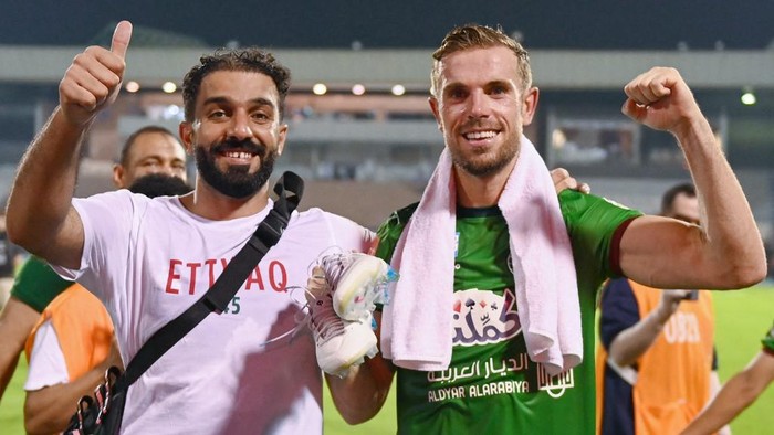 Ettifaqs English midfielder #10 Jordan Henderson celebrates his teams win in the Saudi Pro League football match between Al-Ettifaq and Al-Nassr at the Prince Mohamed bin Fahd Stadium in Dammam on August 14, 2023. (Photo by Ali Alhaji / AFP)