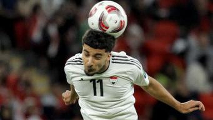 Iraqs midfielder #11 Zidane Iqbal heads the ball during the Qatar 2023 AFC Asian Cup Group D football match between Indonesia and Iraq at the Ahmad bin Ali Stadium in Al-Rayyan, west of Doha on January 15, 2024. (Photo by KARIM JAAFAR / AFP)