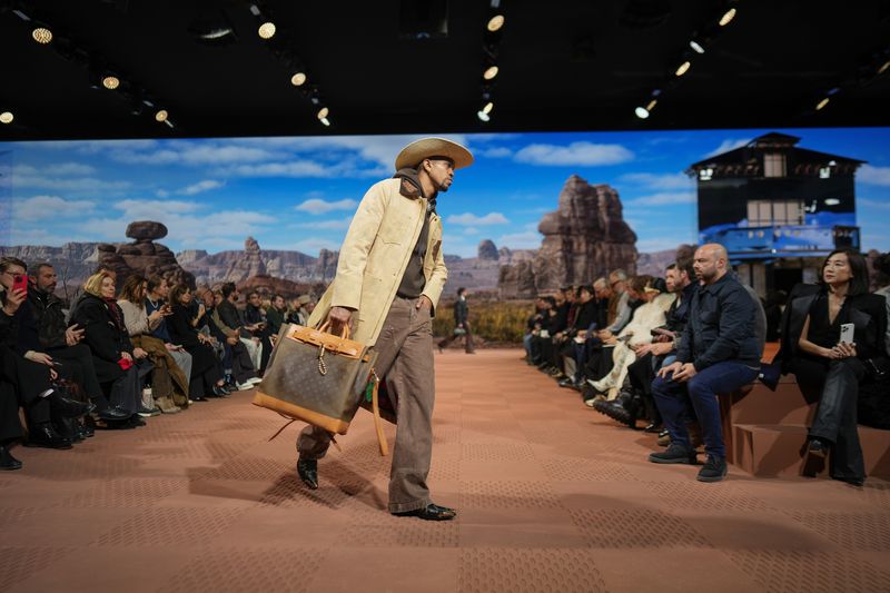 A model wears a creation for Louis Vuitton as part of the Menswear ready-to-wear Fall-Winter 2024-2025 collection presented in Paris, Tuesday, Jan. 16, 2024. (AP Photo/Thibault Camus)