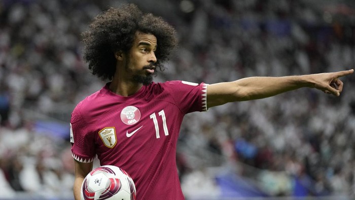 Qatars Akram Afif gestures during the Asian Cup Group A soccer match between Tajikistan and Qatar at Al Bayt stadium, in Al Khor, Qatar, Wednesday, Jan. 17, 2024. (AP Photo/Aijaz Rahi)