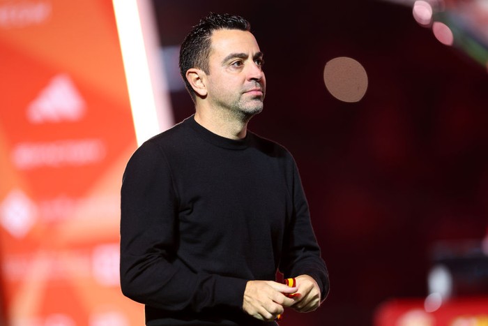 Xavi Hernandez RIYADH, SAUDI ARABIA - JANUARY 14: Xavi, Head Coach of FC Barcelona, looks on with his runners-up medal after the teams defeat in the Super Copa de EspaƱa Final match between Real Madrid and FC Barcelona on January 14, 2024 in Riyadh, Saudi Arabia. (Photo by Yasser Bakhsh/Getty Images)