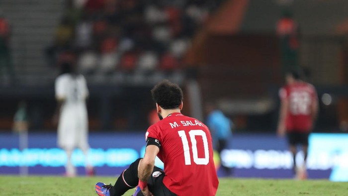 Mohamed Salah ABIDJAN, IVORY COAST - JANUARY 18: Mohamed Salah of Egypt holds his hamstring whilst on the floor with an injury during the TotalEnergies CAF Africa Cup of Nations group stage match between Egypt and Ghana at Stade FΓ©lix HouphouΓ«t-Boigny on January 18, 2024 in Abidjan, Ivory Coast. (Photo by MB Media/Getty Images)