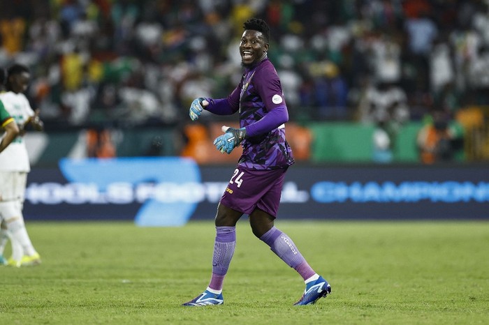 Cameroons goalkeeper #24 Andre Onana gestures during the Africa Cup of Nations (CAN) 2024 group C football match between Senegal and Cameroon at the Stade Charles Konan Banny in Yamoussoukro on January 19, 2024. (Photo by KENZO TRIBOUILLARD / AFP)