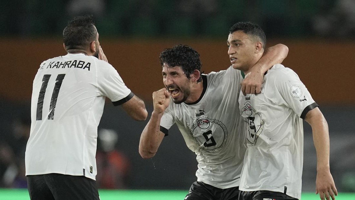 Mesir lolos dramatis ke babak 16 besar Piala Afrika 2023. (Foto: AP/Themba Hadebe)