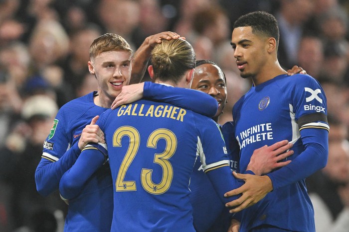 LONDON, ENGLAND - JANUARY 23: Cole Palmer of Chelsea (L) celebrates his goal with team mates during the Carabao Cup Semi Final Second Leg match between Chelsea and Middlesbrough at Stamford Bridge on January 23, 2024 in London, England. (Photo by Vince Mignott/MB Media/Getty Images)