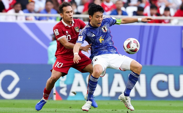 DOHA, QATAR - JANUARY 24: Endo Wataru #6 of Japan competes for the ball with Egy Maulana Vikri #10 of Indonesia during the AFC Asian Cup Group D match between Japan and Indonesia at Al Thumama Stadium on January 24, 2024 in Doha, Qatar. (Photo by Zhizhao Wu/Getty Images)