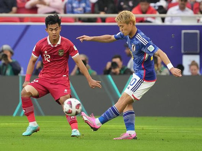 DOHA, QATAR - JANUARY 24: Ritsu Doan of Japan in action during the AFC Asian Cup Group D match between Japan and Indonesia at Al Thumama Stadium on January 24, 2024 in Doha, Qatar. (Photo by Masashi Hara/Getty Images)
