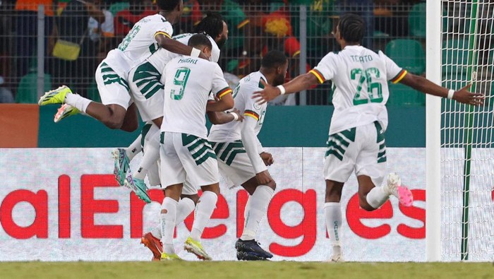 Soccer Football - Africa Cup of Nations - Group C - Gambia v Cameroon - Stade de la Paix, Bouake, Ivory Coast - January 23, 2024 Cameroons Karl Toko Ekambi celebrates scoring their first goal with teammates REUTERS/Luc Gnago