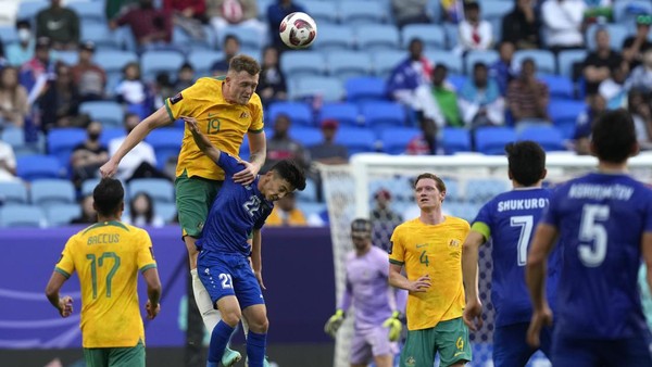 Harry Souttar, Australia Australias Harry Souttar heads the ball over Uzbekistans Abbosbek Fayzullaev during the Asian Cup Group B soccer match between Australia and Uzbekistan at Al Janoub Stadium in Doha, Qatar, Tuesday, Jan. 23, 2024. (AP Photo/Thanassis Stavrakis)