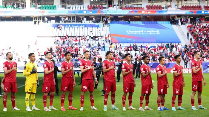 DOHA, QATAR - JANUARY 24: Players of Indonesia line up for team photo during the AFC Asian Cup Group D match between Japan and Indonesia at Al Thumama Stadium on January 24, 2024 in Doha, Qatar. (Photo by Zhizhao Wu/Getty Images)