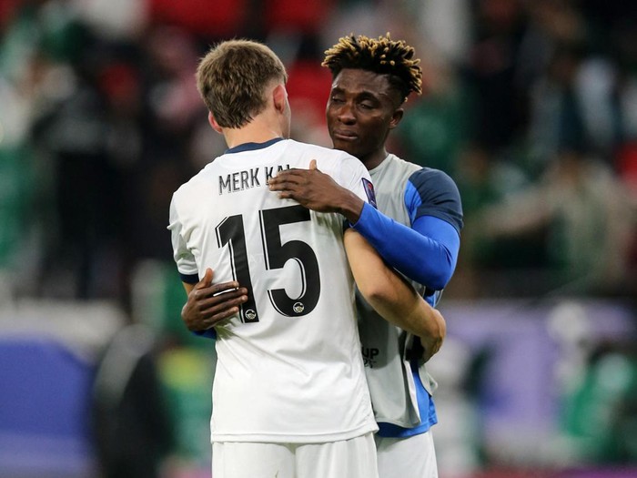 Soccer Football - AFC Asian Cup - Group F - Kyrgyzstan v Saudi Arabia - Ahmad bin Ali Stadium, Al Rayyan, Qatar - January 21, 2024 Kyrgyzstan's Kai Merk and Joel Kojo look dejected after the match REUTERS/Ibraheem Al Omari