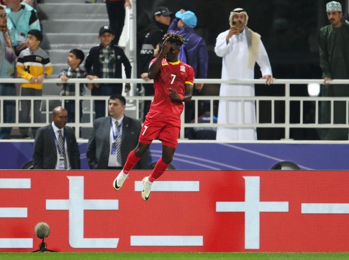 DOHA, QATAR - JANUARY 25: Joel Kojo of Kyrgyzstan celebrates scoring his team's first goal during the AFC Asian Cup Group F match between Kyrgyzstan and Oman at Abdullah Bin Khalifa Stadium on January 25, 2024 in Doha, Qatar. (Photo by Adam Nurkiewicz/Getty Images)