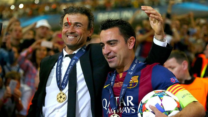 BERLIN, GERMANY - JUNE 06:  Luis Enrique, head coach of Barcelona celebrates with his player Xavi Hernandez after winning the UEFA Champions League Finale between Juventus Turin and FC Barcelona at Olympiastadion on June 6, 2015 in Berlin, Germany.  (Photo by Alexander Hassenstein - UEFA/UEFA via Getty Images)