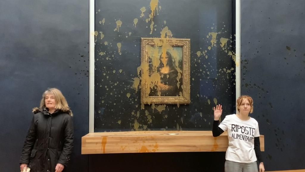 Lukisan Mona Lisa Jadi Sasaran Amuk Aktivis Lingkungan Lukisan Mona Lisa Jadi Sasaran Amuk Aktivis Lingkungan