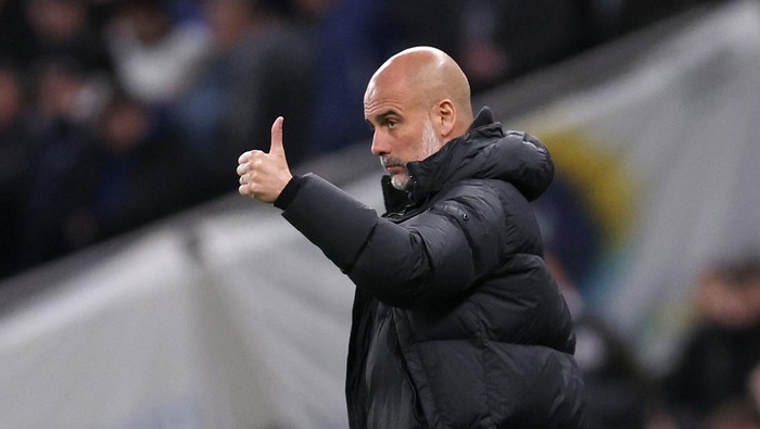 Pep Guardiola Soccer Football - FA Cup - Fourth Round - Tottenham Hotspur v Manchester City - Tottenham Hotspur Stadium, London, Britain - January 26, 2024 Manchester City manager Pep Guardiola reacts REUTERS/David Klein