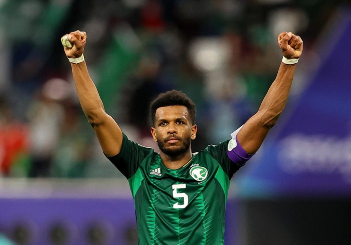 Soccer Football - AFC Asian Cup - Group F - Saudi Arabia v Oman - Khalifa International Stadium, Al Rayyan, Qatar - January 16, 2024 Saudi Arabias Ali Al-Bulayhi celebrates scoring their second goal REUTERS/Ibraheem Al Omari