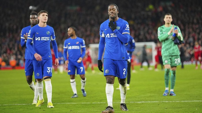 Chelsea players cheer supporters at the end of the English Premier League soccer match between Liverpool and Chelsea, at Anfield Stadium, Liverpool, England, Wednesday, Jan.31, 2024. (AP Photo/Jon Super)