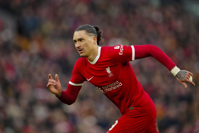 Liverpools Darwin Nunez runs during the English FA Cup fourth round soccer match between Liverpool and Norwich, at Anfield stadium in Liverpool, England, Sunday, Jan. 28, 2024. (AP Photo/Jon Super)